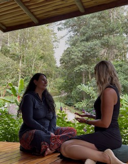 two women face to face talking